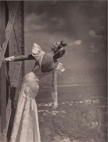 Model wearing Mainbocher dress at the Eiffel Tower, Harper’s Bazaar, 1939