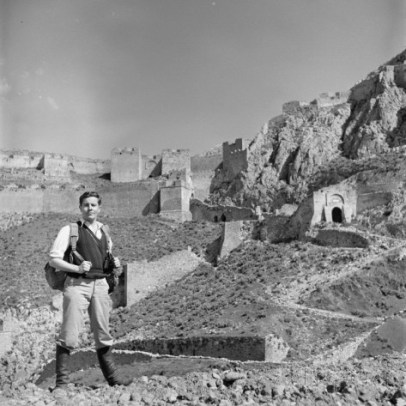 fulbright-scholar-and-archaeology-student-kevin-andrews-standing-in-front-of-castle-ruins