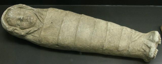 Etruscan terracotta swaddled baby, 3rd-2nd century BC.